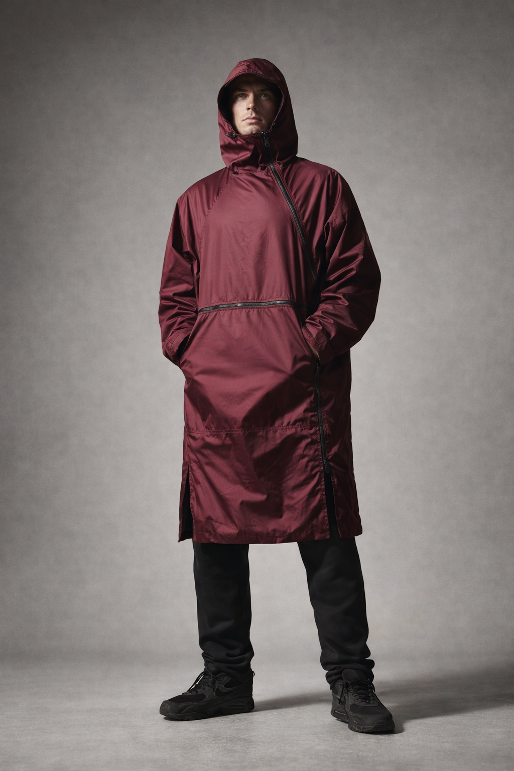 V1 RoamCoat waterproof packable travel coat in burgundy — front view